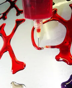 Dispensing coloured resin